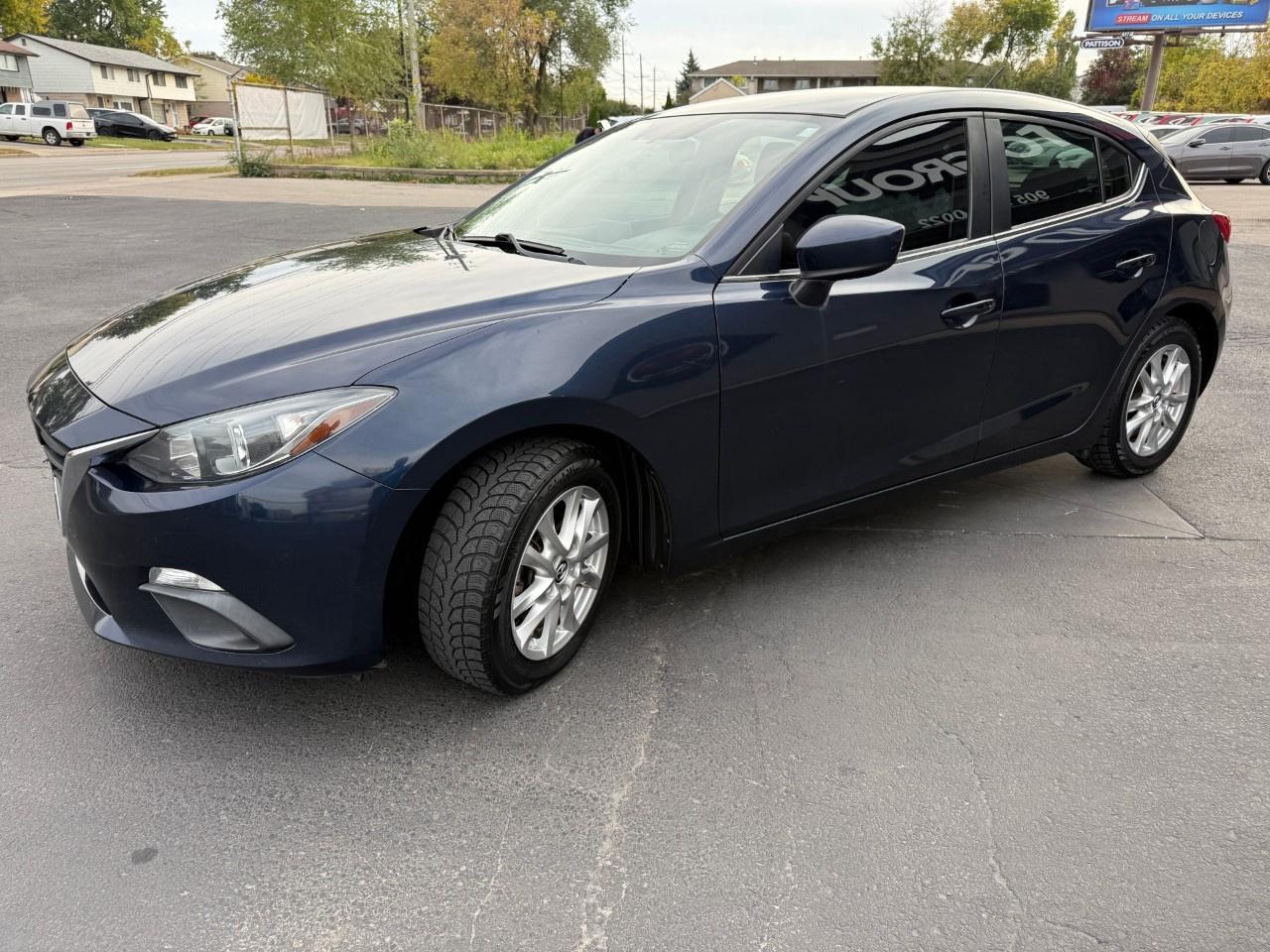 2015 Mazda MAZDA3 4DR HB SPORT AUTO GS Photo