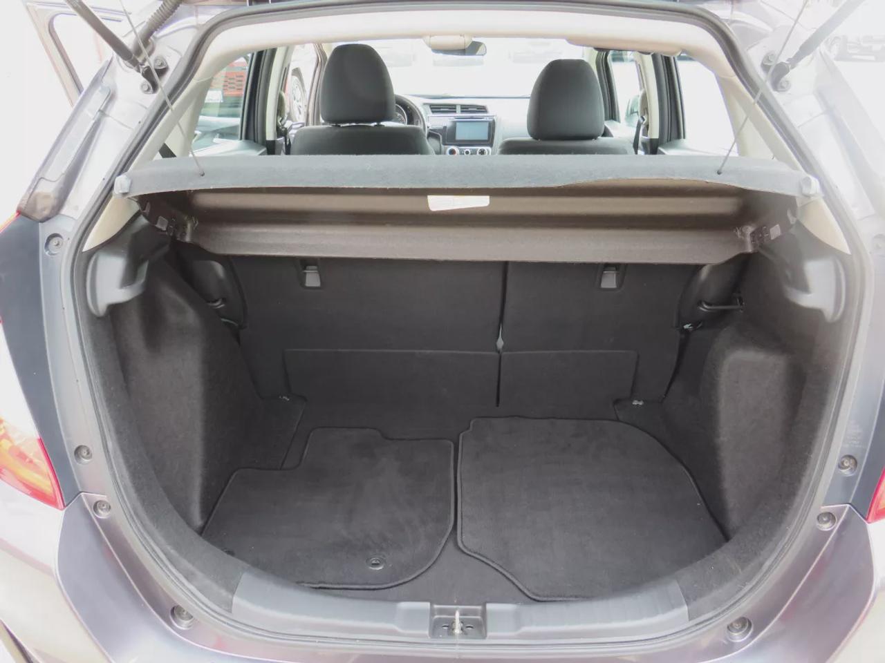 2016 Honda Fit EX | FWD | Automatic | Low Kms | Alloy Wheels | Heated Seats | Air Conditioning | Power Moonroof | Touchscreen Display | Bluetooth | Back-Up Camera | Honda LaneWatch | Cruise Control | Paddle Shifters | Steering Wheel Audio Controls | USB Input | HDMI Inp Photo