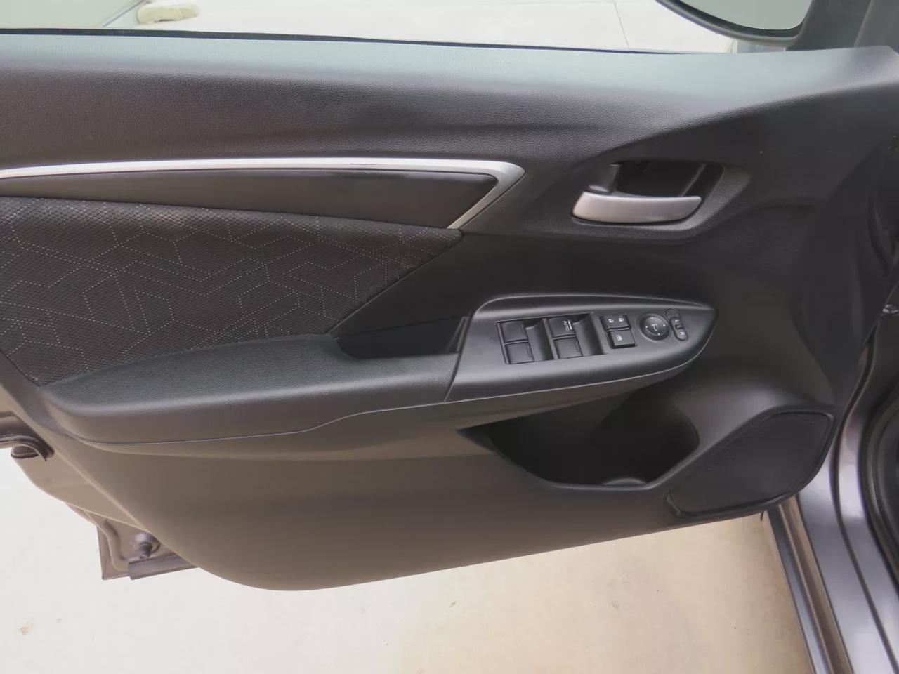 2016 Honda Fit EX | FWD | Automatic | Low Kms | Alloy Wheels | Heated Seats | Air Conditioning | Power Moonroof | Touchscreen Display | Bluetooth | Back-Up Camera | Honda LaneWatch | Cruise Control | Paddle Shifters | Steering Wheel Audio Controls | USB Input | HDMI Inp Photo