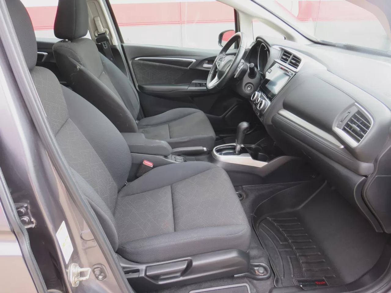 2016 Honda Fit EX | FWD | Automatic | Low Kms | Alloy Wheels | Heated Seats | Air Conditioning | Power Moonroof | Touchscreen Display | Bluetooth | Back-Up Camera | Honda LaneWatch | Cruise Control | Paddle Shifters | Steering Wheel Audio Controls | USB Input | HDMI Inp Photo