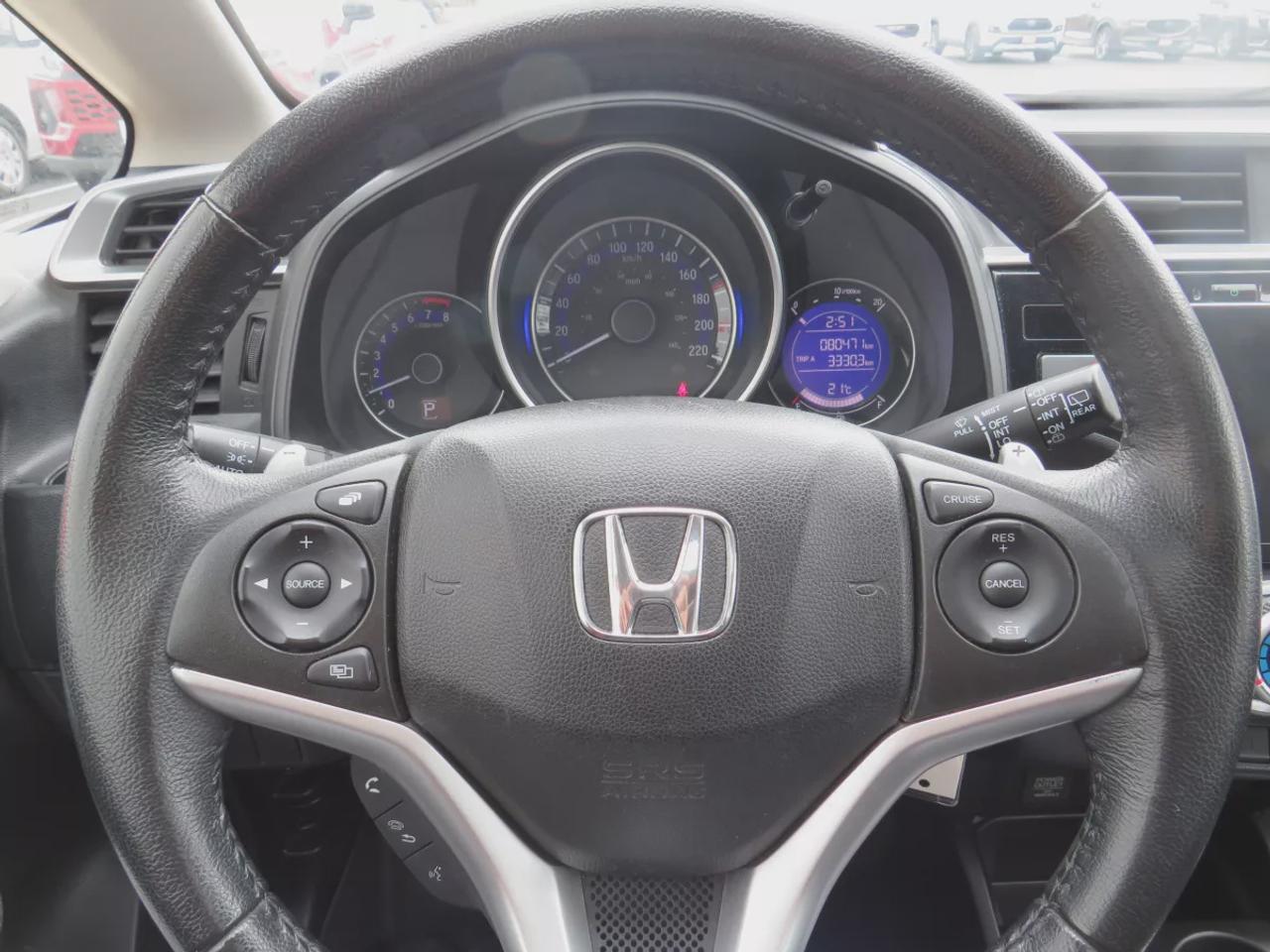 2016 Honda Fit EX | FWD | Automatic | Low Kms | Alloy Wheels | Heated Seats | Air Conditioning | Power Moonroof | Touchscreen Display | Bluetooth | Back-Up Camera | Honda LaneWatch | Cruise Control | Paddle Shifters | Steering Wheel Audio Controls | USB Input | HDMI Inp Photo