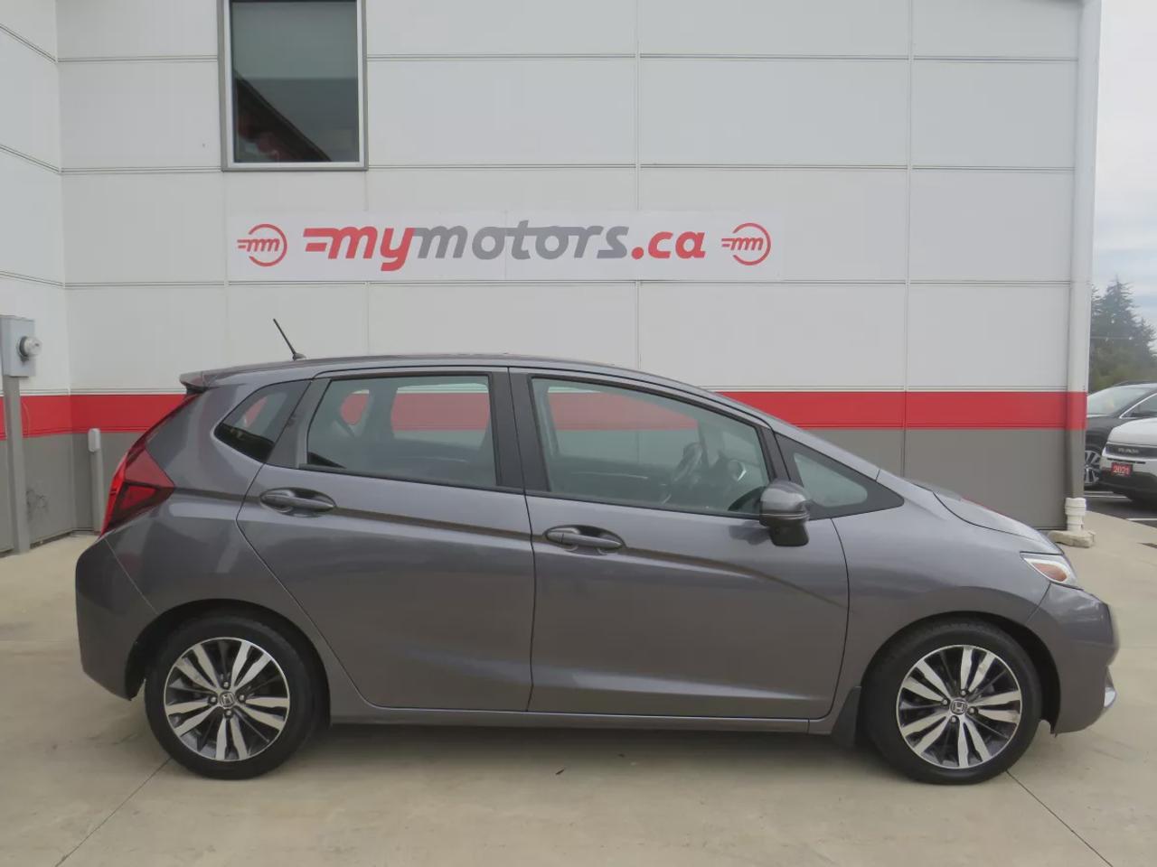 2016 Honda Fit EX | FWD | Automatic | Low Kms | Alloy Wheels | Heated Seats | Air Conditioning | Power Moonroof | Touchscreen Display | Bluetooth | Back-Up Camera | Honda LaneWatch | Cruise Control | Paddle Shifters | Steering Wheel Audio Controls | USB Input | HDMI Inp Photo