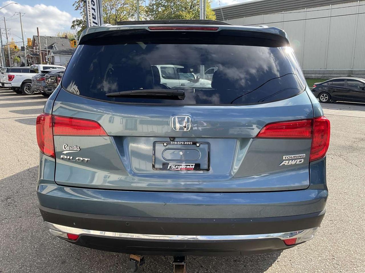 2018 Honda Pilot Touring 4WD - LTHR! NAV! BACK-UP CAM! BSM! DVD! DUAL ROOF! Photo