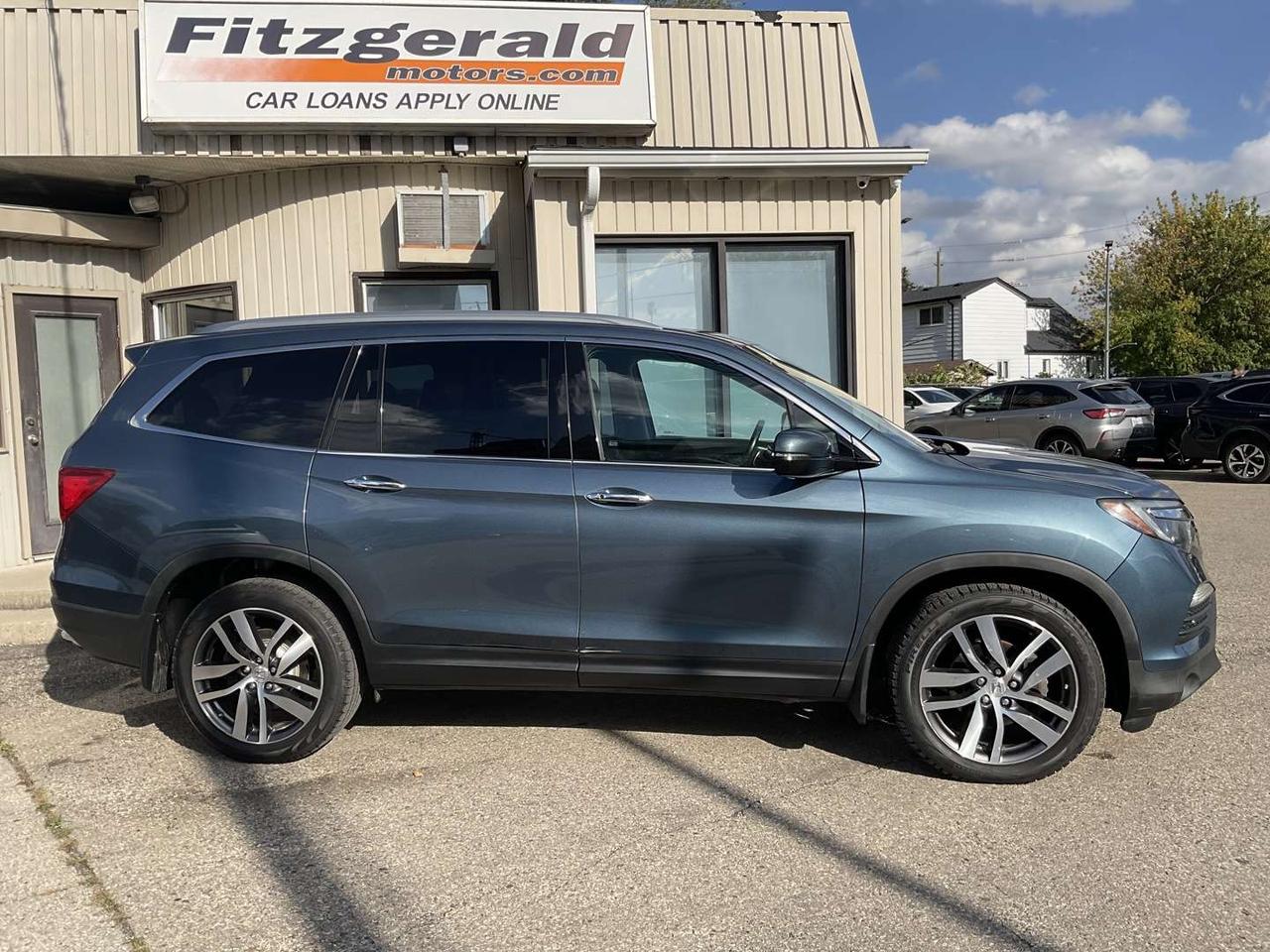 2018 Honda Pilot Touring 4WD - LTHR! NAV! BACK-UP CAM! BSM! DVD! DUAL ROOF! Photo