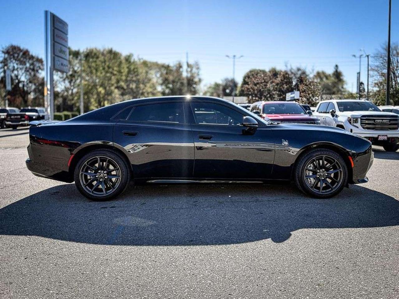 2026 Dodge Charger Scat Pack   4-DOOR   PLUS   BLACKTOP   CARBON & SUEDE   GLASS ROOF   HEATED/VENTILATED LEATHER   ALPINE AUDIO Photo