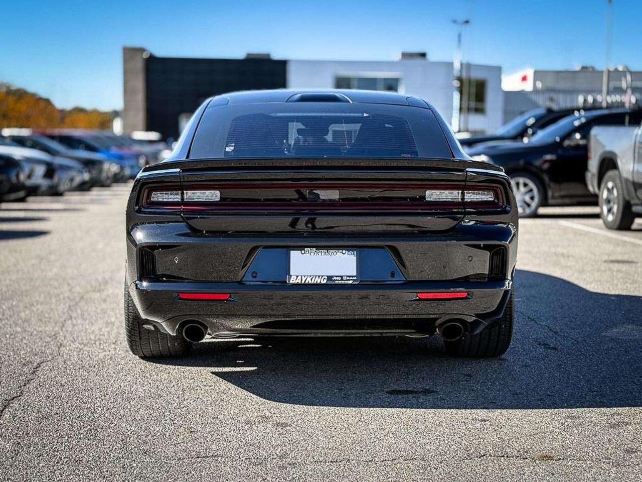 2026 Dodge Charger Scat Pack   4-DOOR   PLUS   BLACKTOP   CARBON & SUEDE   GLASS ROOF   HEATED/VENTILATED LEATHER   ALPINE AUDIO Photo