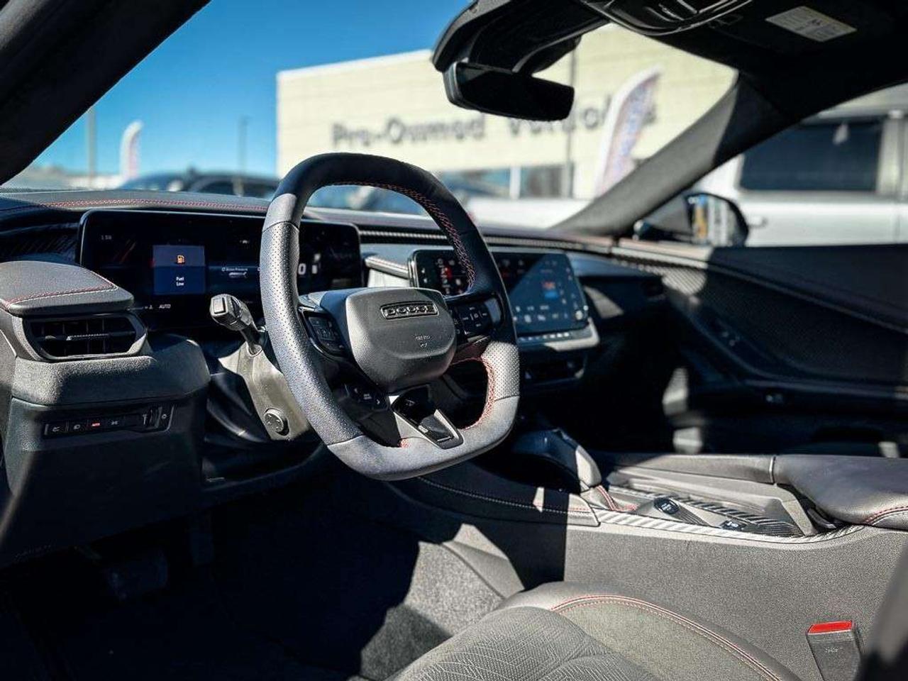 2026 Dodge Charger Scat Pack   4-DOOR   PLUS   BLACKTOP   CARBON & SUEDE   GLASS ROOF   HEATED/VENTILATED LEATHER   ALPINE AUDIO Photo