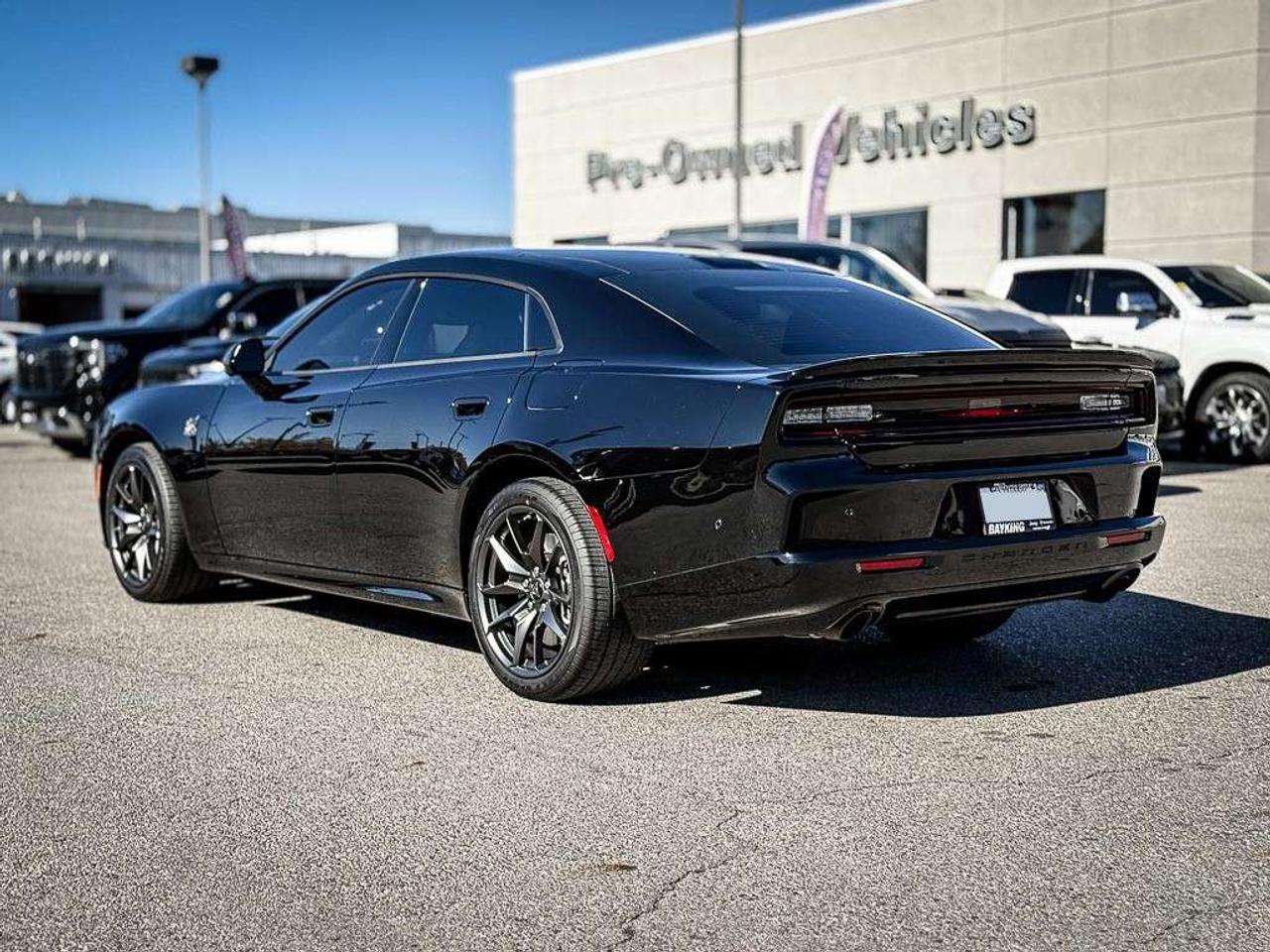 2026 Dodge Charger Scat Pack   4-DOOR   PLUS   BLACKTOP   CARBON & SUEDE   GLASS ROOF   HEATED/VENTILATED LEATHER   ALPINE AUDIO Photo