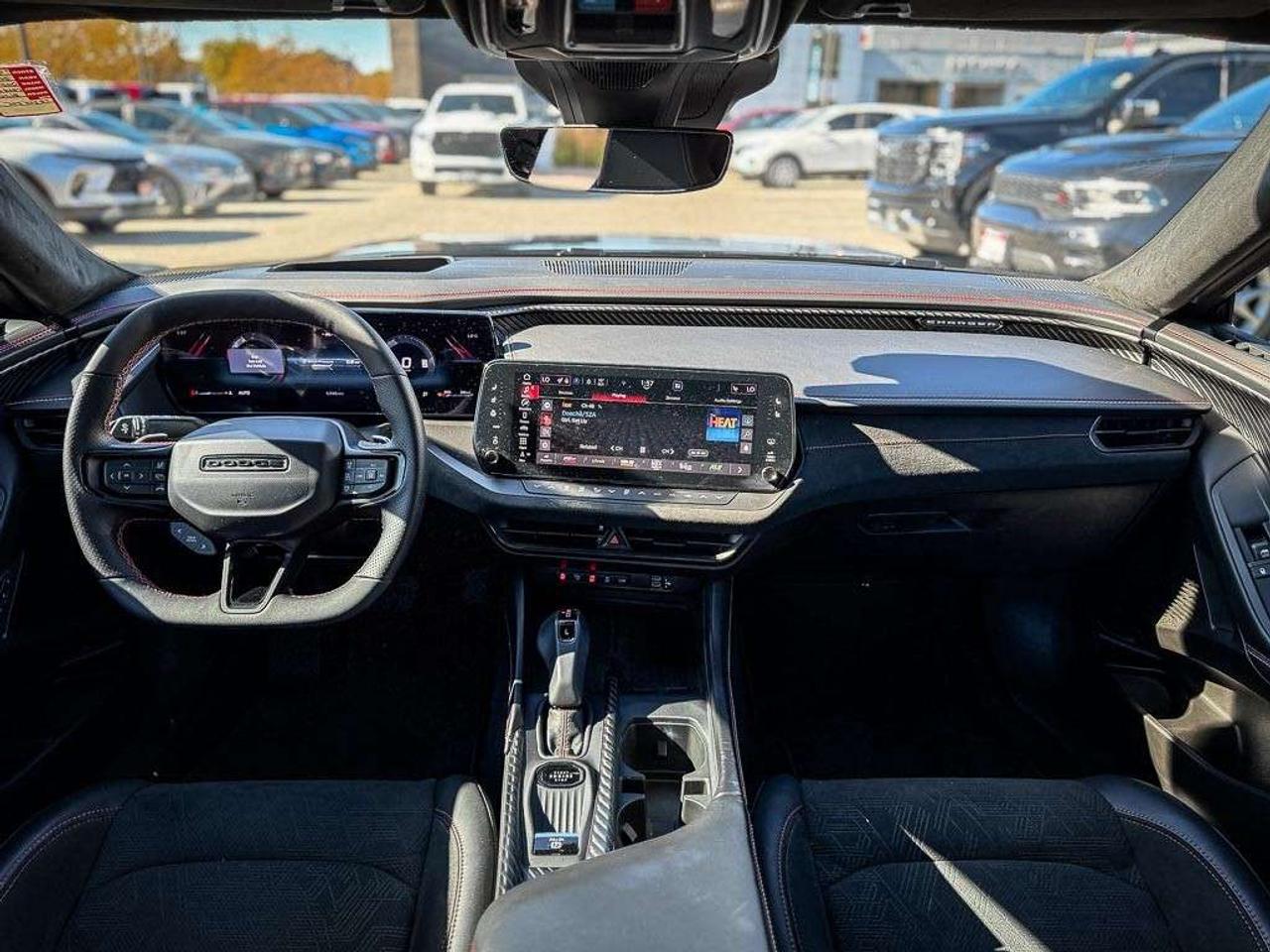 2026 Dodge Charger Scat Pack   4-DOOR   PLUS   BLACKTOP   CARBON & SUEDE   GLASS ROOF   HEATED/VENTILATED LEATHER   ALPINE AUDIO Photo