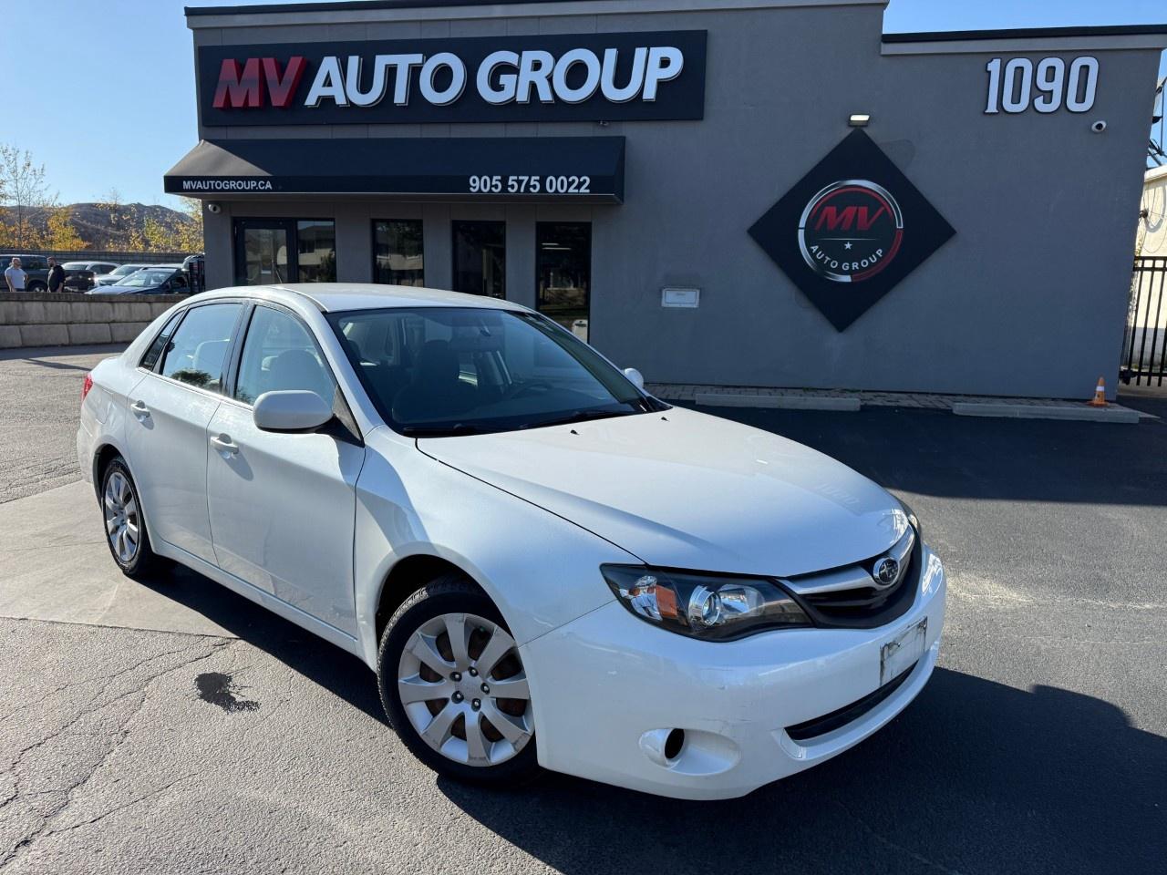 2010 Subaru Impreza 4dr Sdn Auto 2.5i Photo0