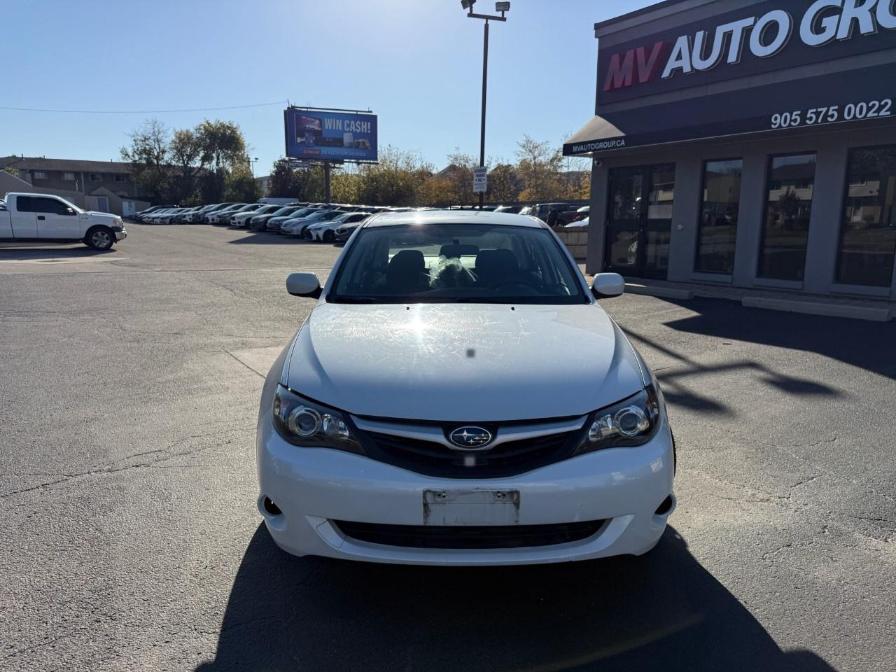 2010 Subaru Impreza 4dr Sdn Auto 2.5i Photo1