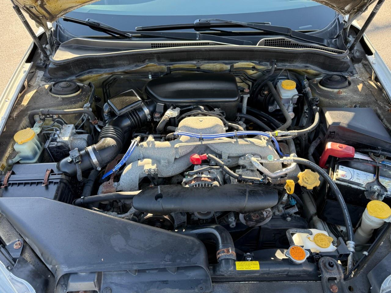 2010 Subaru Impreza 4dr Sdn Auto 2.5i Photo