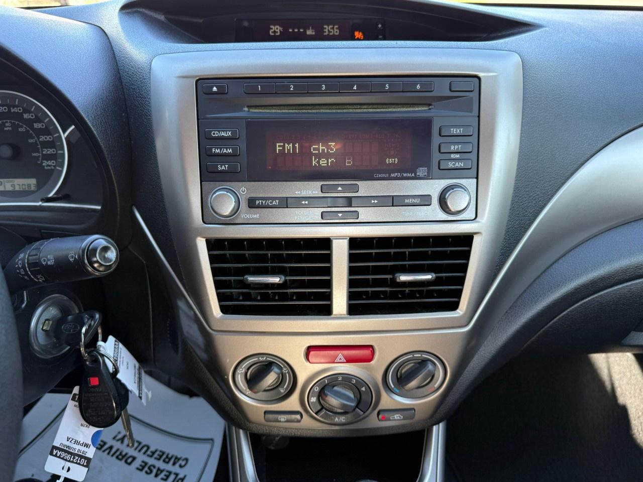 2010 Subaru Impreza 4dr Sdn Auto 2.5i Photo