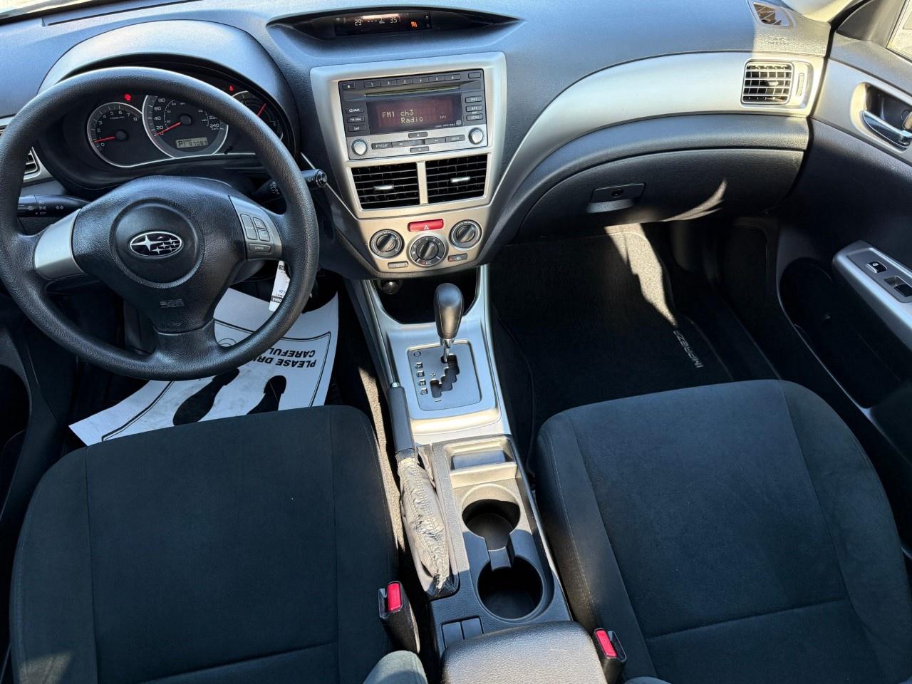2010 Subaru Impreza 4dr Sdn Auto 2.5i Photo