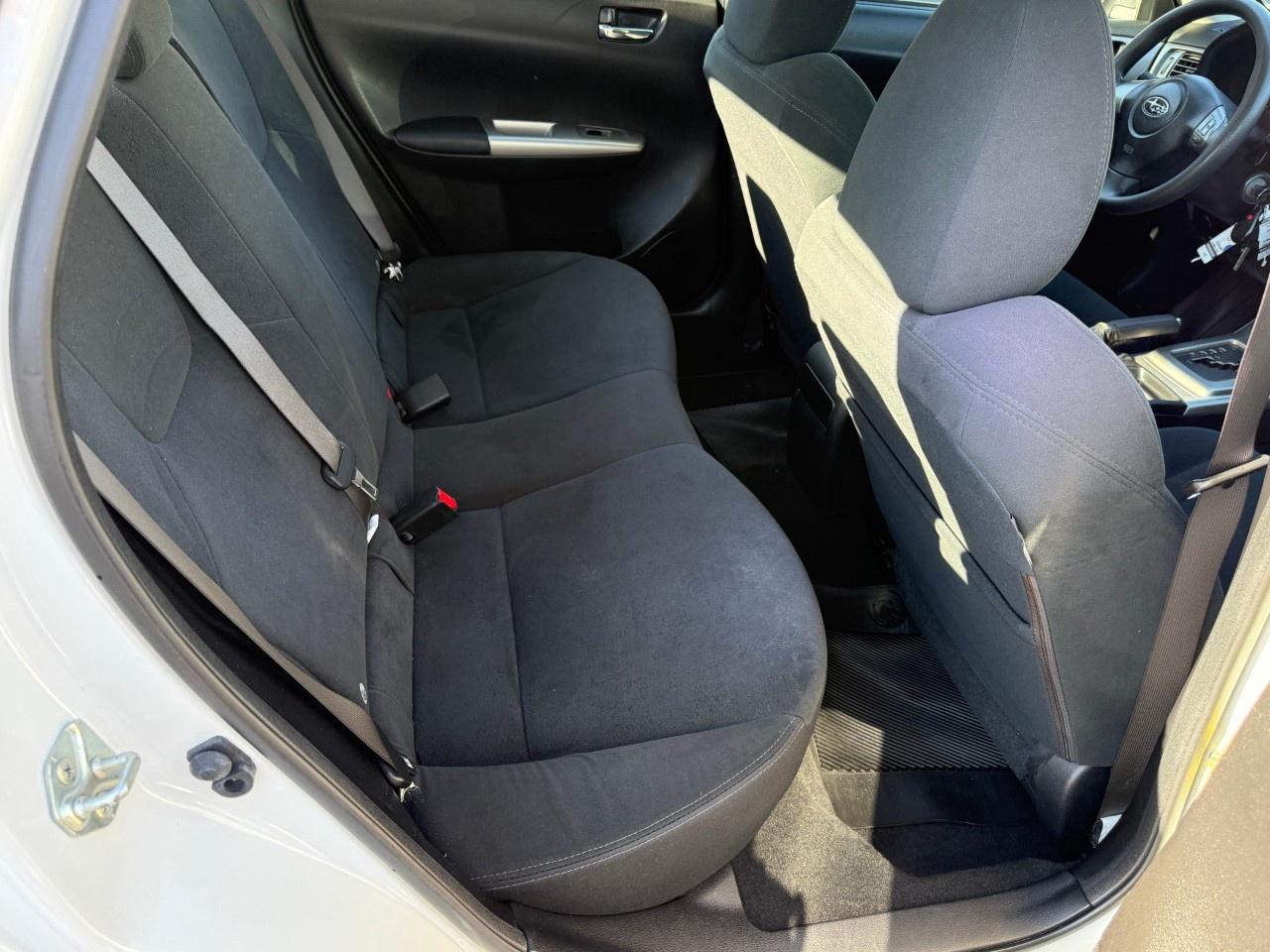 2010 Subaru Impreza 4dr Sdn Auto 2.5i Photo