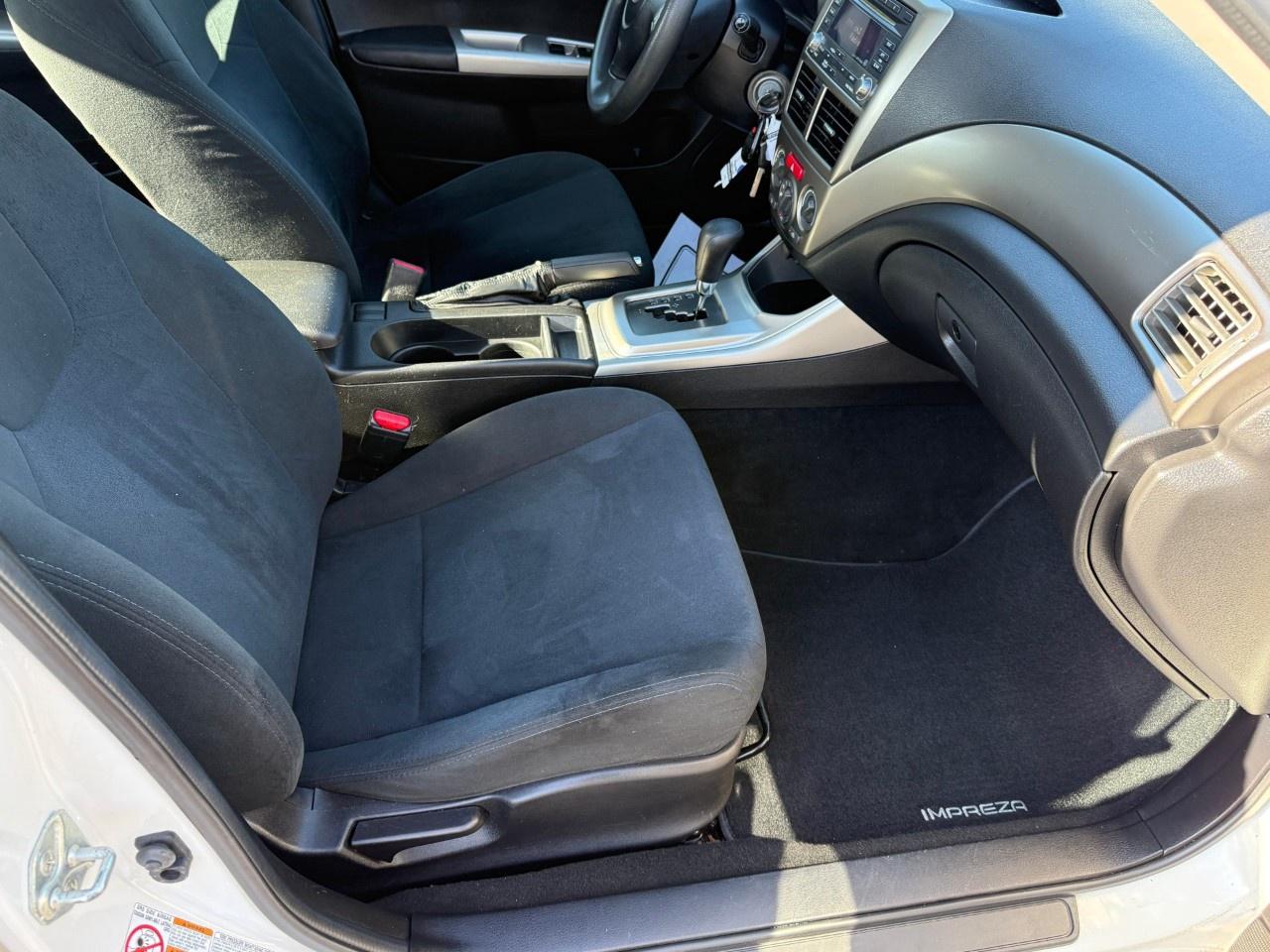 2010 Subaru Impreza 4dr Sdn Auto 2.5i Photo