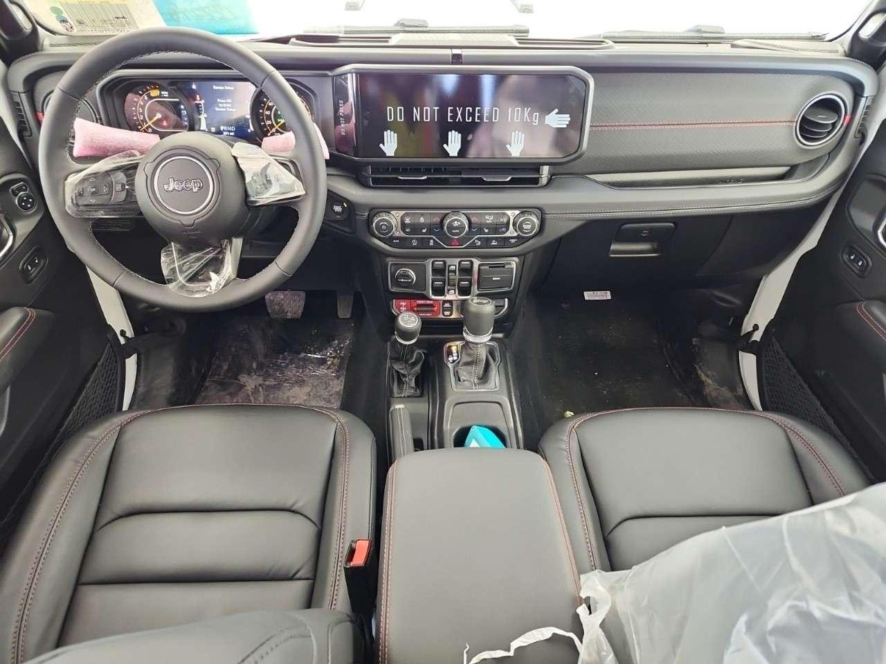 2026 Jeep Wrangler Rubicon X 4 Door 4x4 X   STEEL BUMPERS   CARPLAY   HEATED SEATS   REMOTE START   PERFORMANCE HOOD Photo