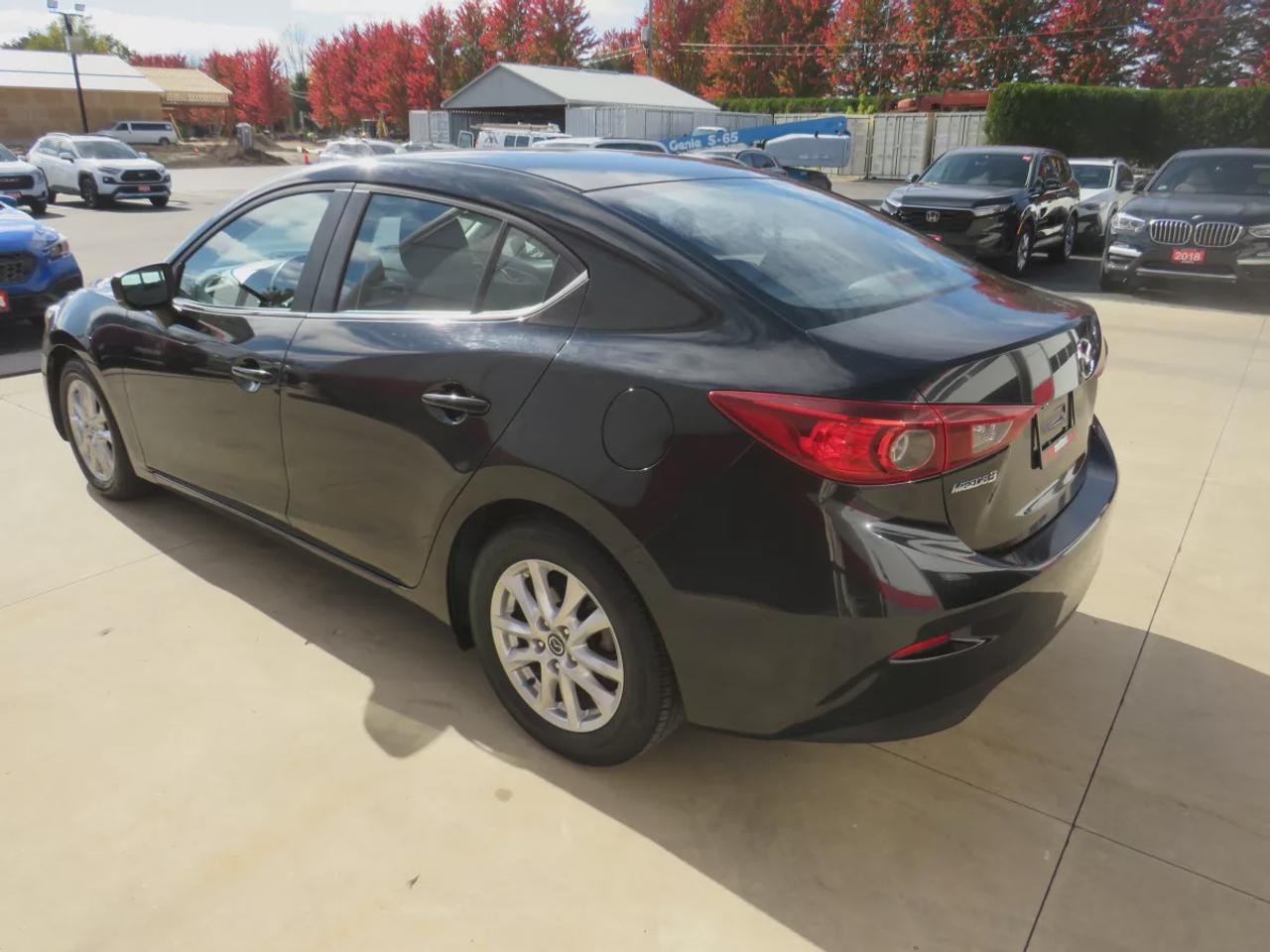 2017 Mazda MAZDA3 GS | LOW KMS | FWD | Automatic | Alloy Wheels | Heated Seats | Heated Steering Wheel | Air Conditioning | Touchscreen Display | Bluetooth | Back-Up Camera | Blind Spot Monitor | Cruise Control | Rain-Sensing Wipers |  Heated Power Mirrors Photo