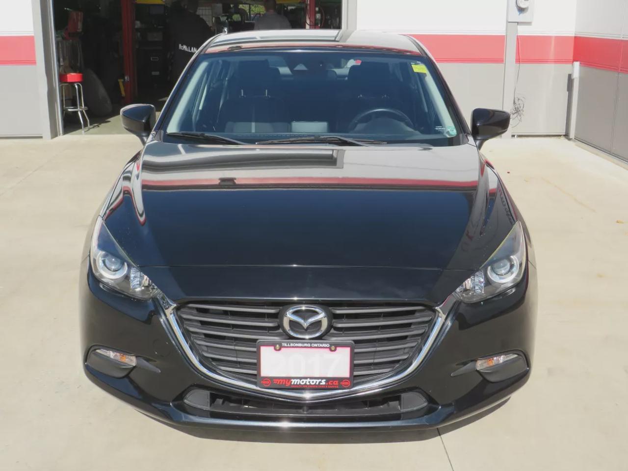 2017 Mazda MAZDA3 GS | LOW KMS | FWD | Automatic | Alloy Wheels | Heated Seats | Heated Steering Wheel | Air Conditioning | Touchscreen Display | Bluetooth | Back-Up Camera | Blind Spot Monitor | Cruise Control | Rain-Sensing Wipers |  Heated Power Mirrors Photo