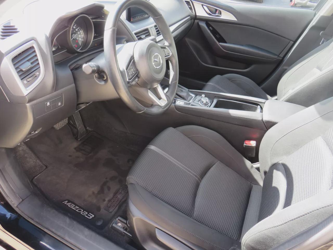 2017 Mazda MAZDA3 GS | LOW KMS | FWD | Automatic | Alloy Wheels | Heated Seats | Heated Steering Wheel | Air Conditioning | Touchscreen Display | Bluetooth | Back-Up Camera | Blind Spot Monitor | Cruise Control | Rain-Sensing Wipers |  Heated Power Mirrors Photo
