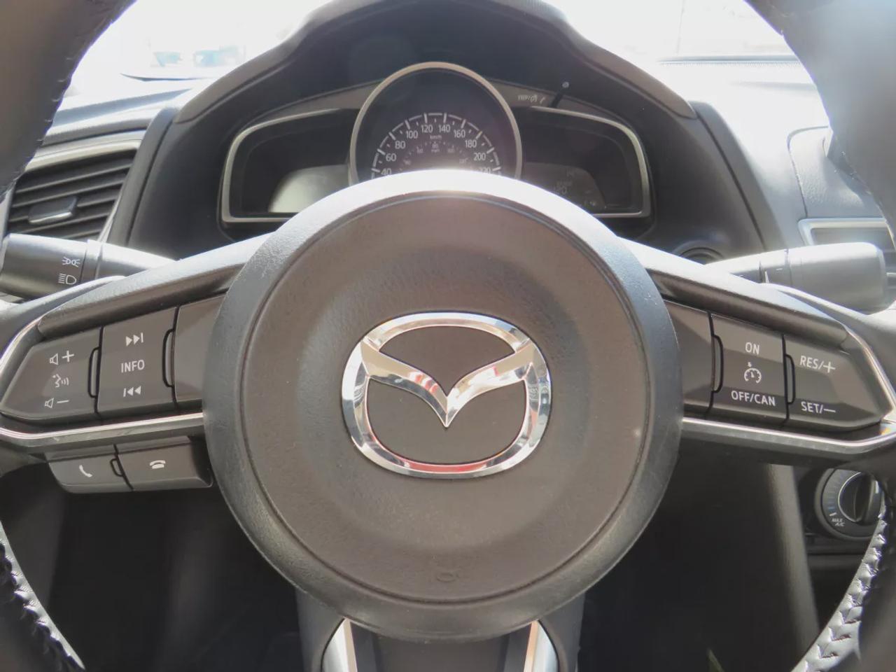 2017 Mazda MAZDA3 GS | LOW KMS | FWD | Automatic | Alloy Wheels | Heated Seats | Heated Steering Wheel | Air Conditioning | Touchscreen Display | Bluetooth | Back-Up Camera | Blind Spot Monitor | Cruise Control | Rain-Sensing Wipers |  Heated Power Mirrors Photo