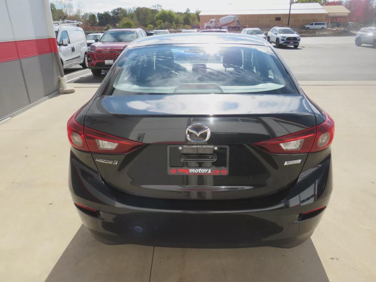 2017 Mazda MAZDA3 GS | LOW KMS | FWD | Automatic | Alloy Wheels | Heated Seats | Heated Steering Wheel | Air Conditioning | Touchscreen Display | Bluetooth | Back-Up Camera | Blind Spot Monitor | Cruise Control | Rain-Sensing Wipers |  Heated Power Mirrors Photo