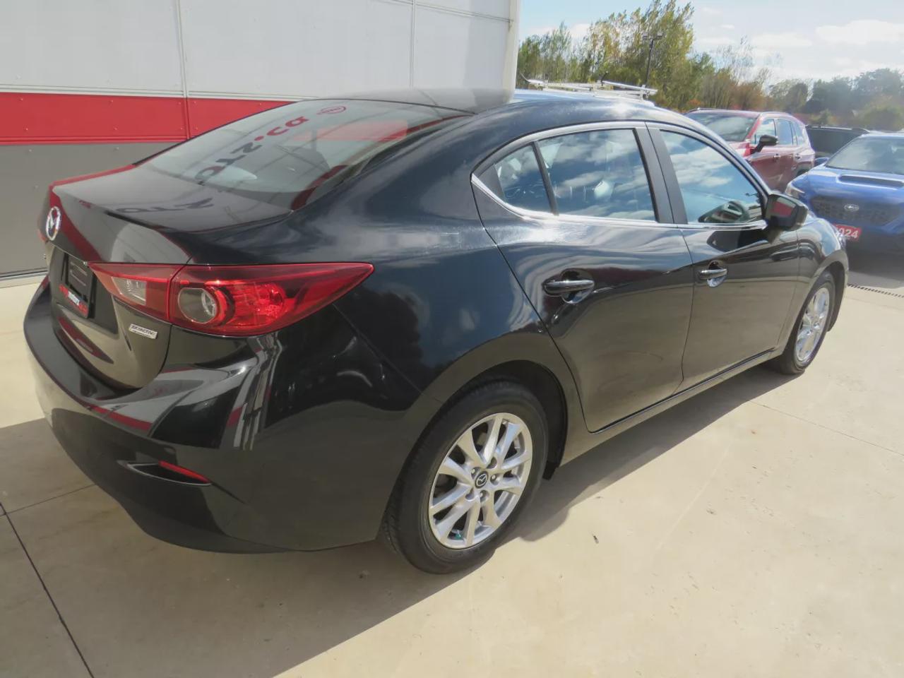 2017 Mazda MAZDA3 GS | LOW KMS | FWD | Automatic | Alloy Wheels | Heated Seats | Heated Steering Wheel | Air Conditioning | Touchscreen Display | Bluetooth | Back-Up Camera | Blind Spot Monitor | Cruise Control | Rain-Sensing Wipers |  Heated Power Mirrors Photo