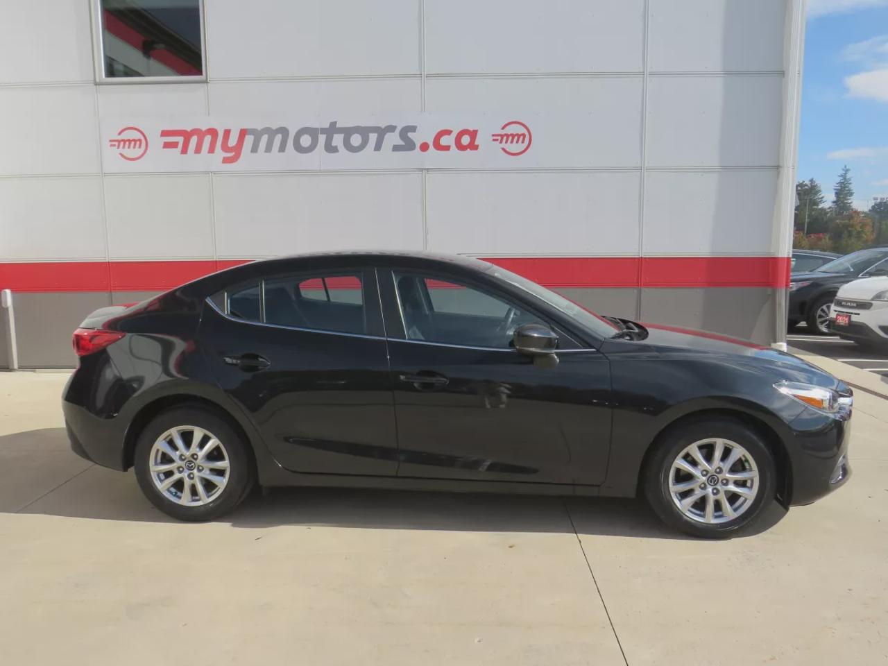 2017 Mazda MAZDA3 GS | LOW KMS | FWD | Automatic | Alloy Wheels | Heated Seats | Heated Steering Wheel | Air Conditioning | Touchscreen Display | Bluetooth | Back-Up Camera | Blind Spot Monitor | Cruise Control | Rain-Sensing Wipers |  Heated Power Mirrors Photo
