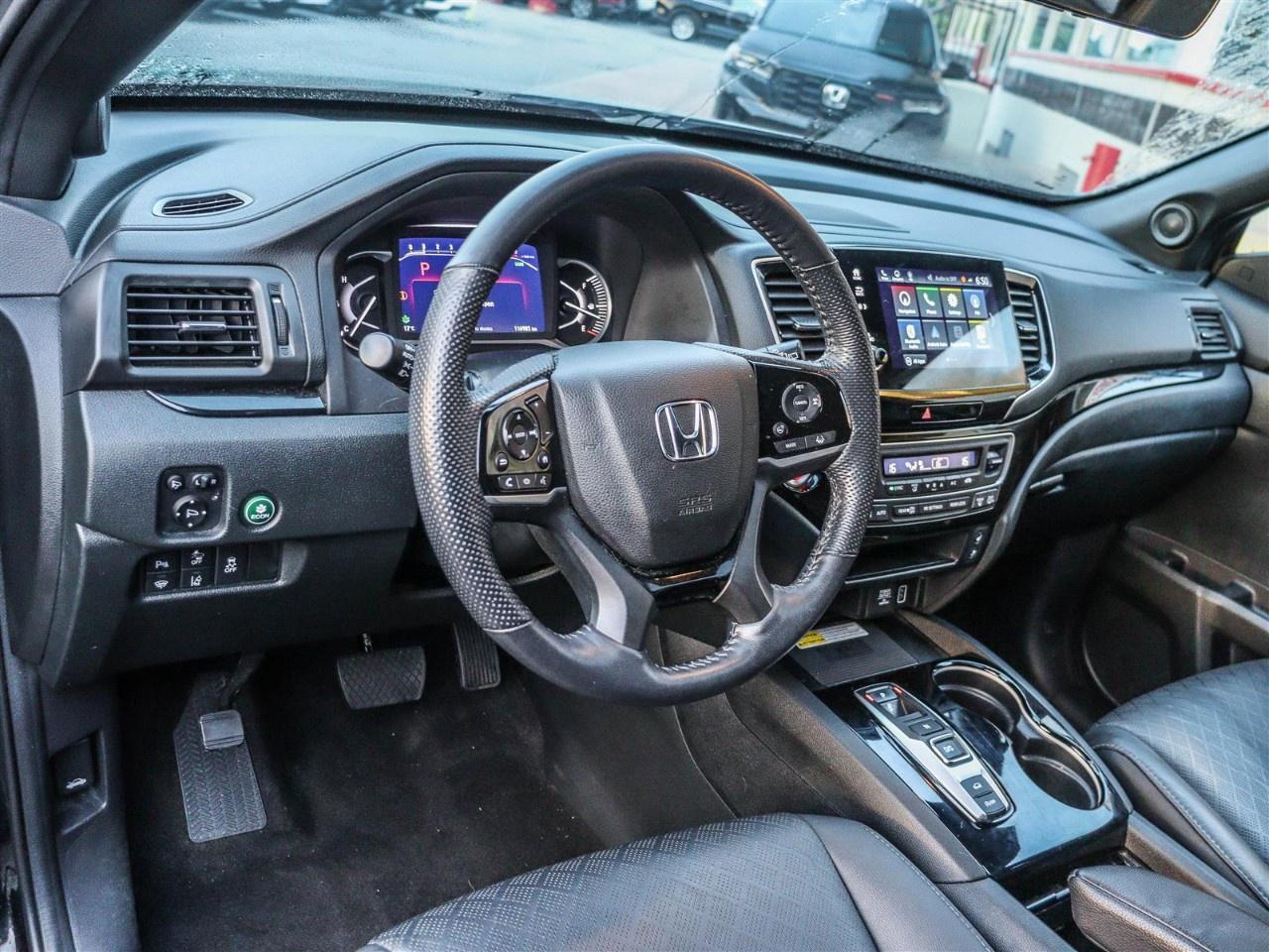 2023 Honda Passport Touring AWD Photo