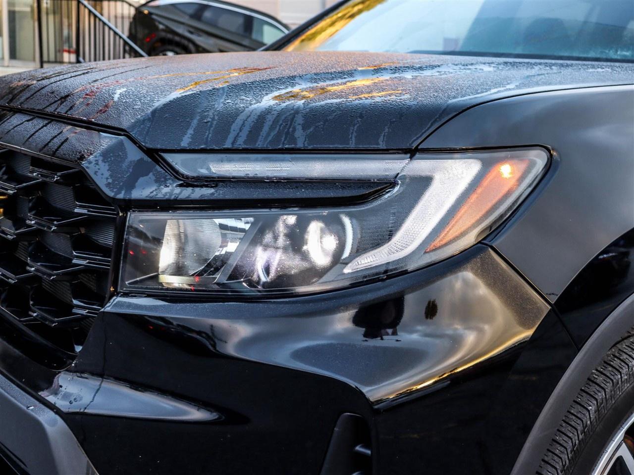 2023 Honda Passport Touring AWD Photo