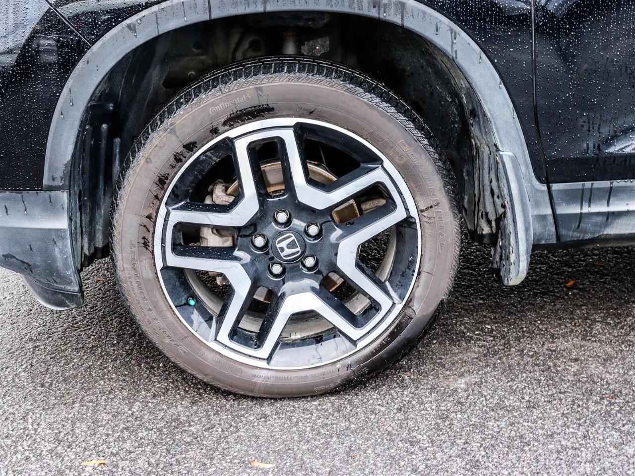 2023 Honda Passport Touring AWD Photo