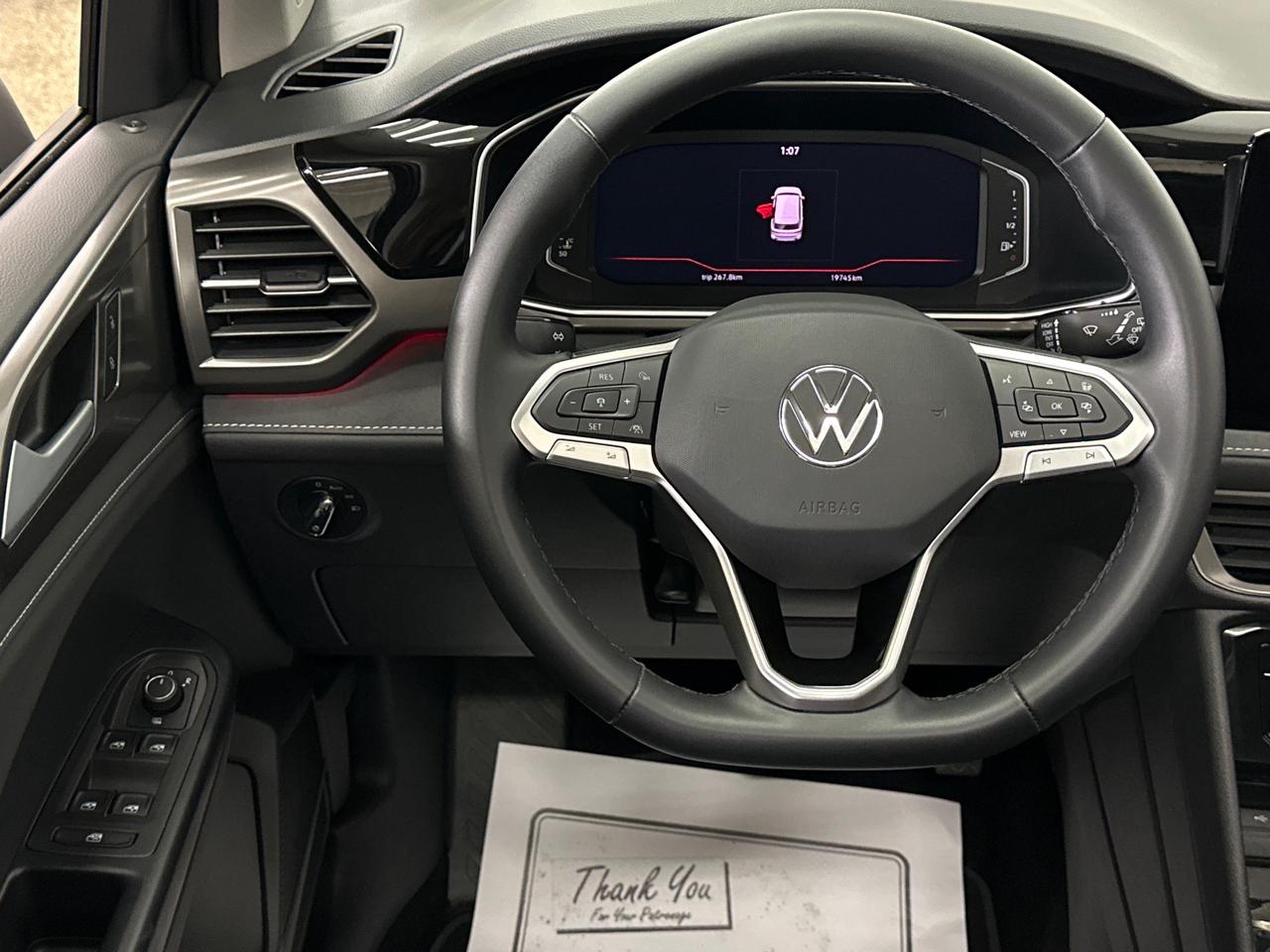 2026 Volkswagen Taos Comfortline Black Edition COMFORTLINE/BLACK EDITION/4MOTION/PANOROOF/19KM! Photo