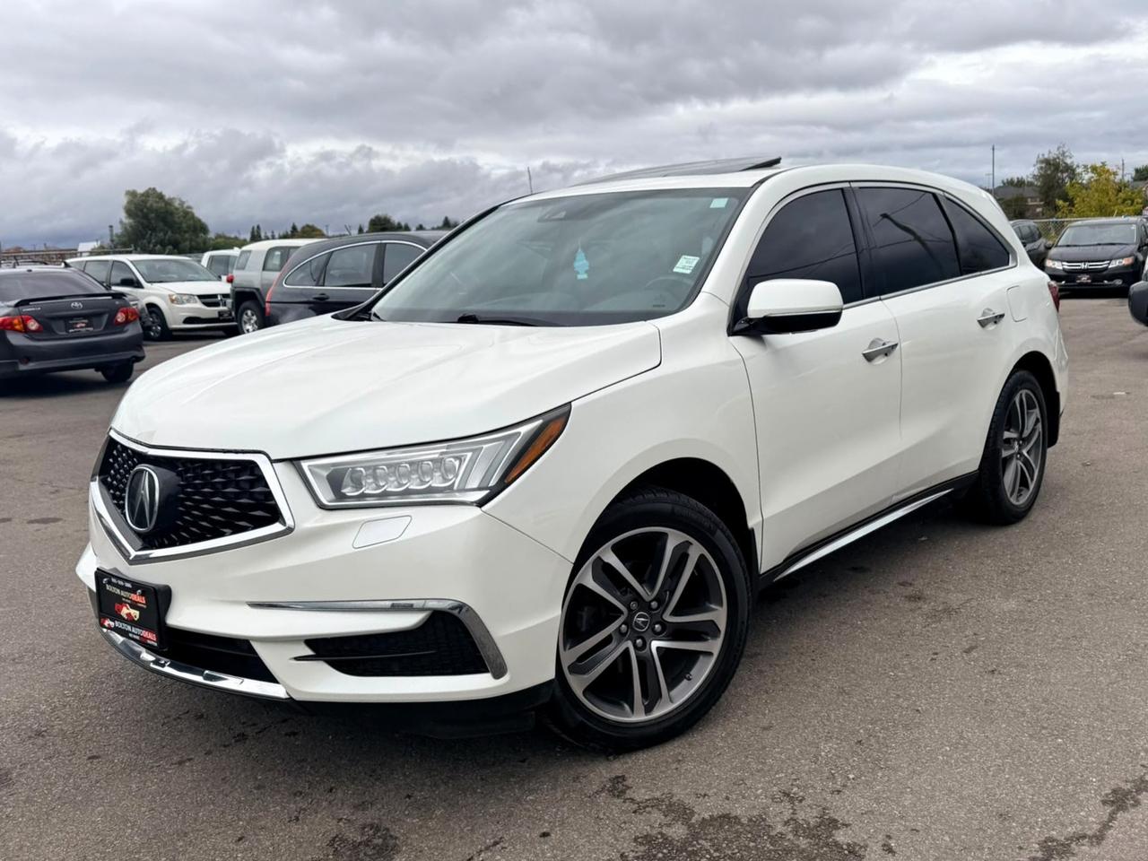 2017 Acura MDX SH-AWD 4dr Nav Pkg Photo