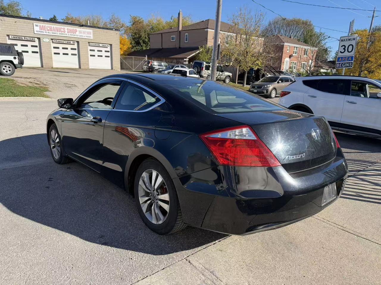 2009 Honda Accord 2dr I4 Auto EX-L Photo
