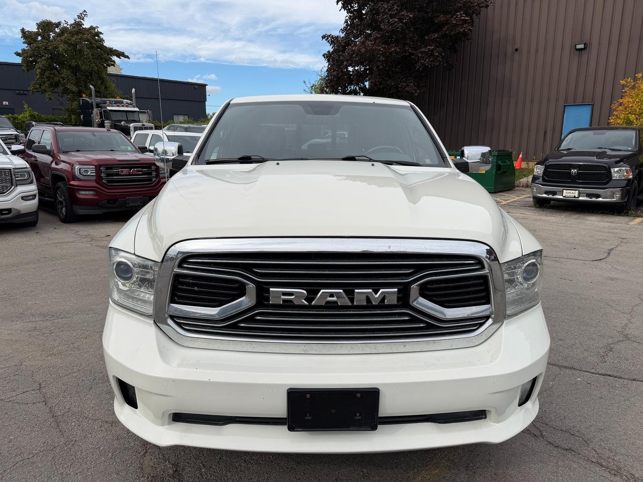 2016 RAM 1500 4WD CREW CAB 140.5" LIMITED Photo
