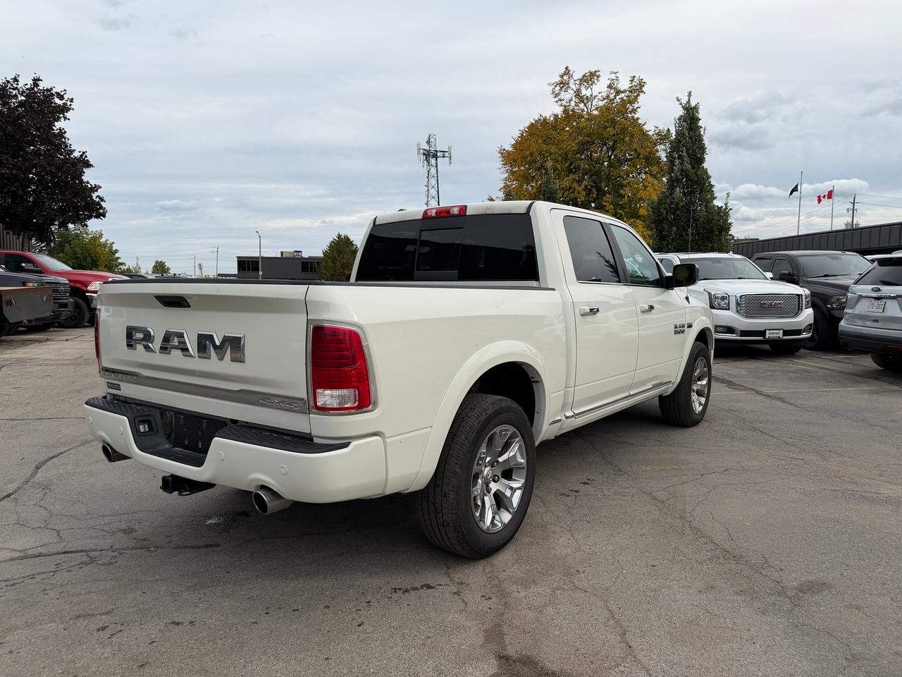 2016 RAM 1500 4WD CREW CAB 140.5" LIMITED Photo