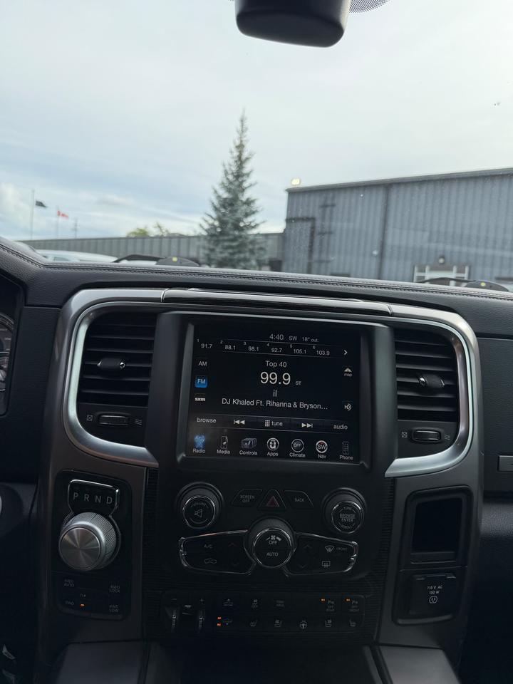 2016 RAM 1500 4WD CREW CAB 140.5" LIMITED Photo