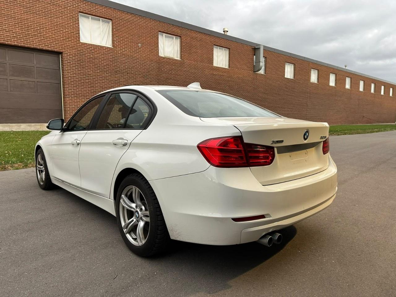 2013 BMW 3 Series 4dr Sdn 328i xDrive Classic Line AWD *Ltd Avail* Photo