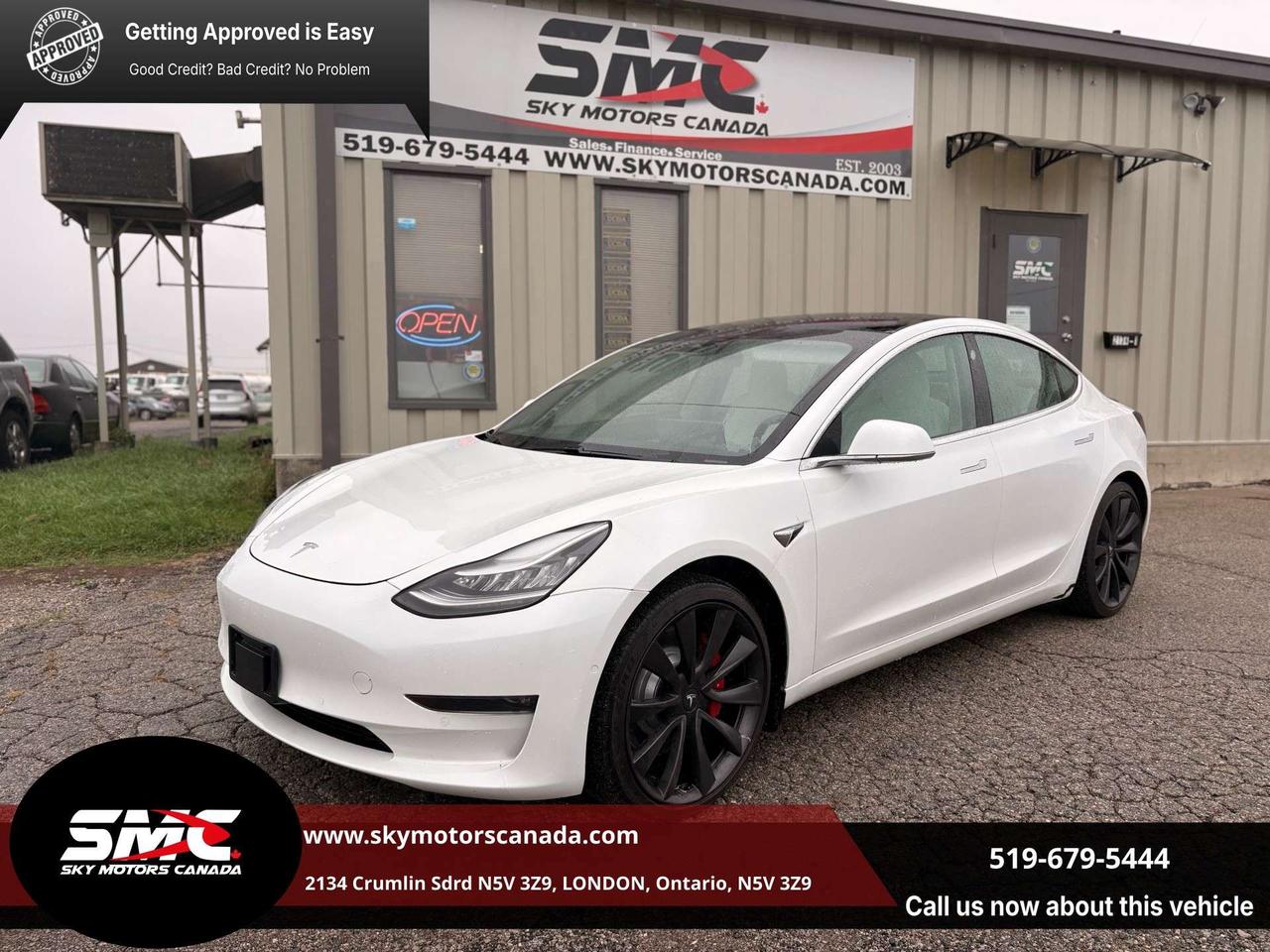 2020 Tesla Model 3 Performance, AWD, White on White, Photo