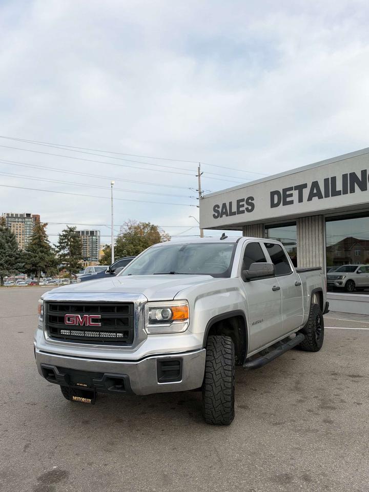 2015 GMC Sierra 1500 4WD Crew Cab Photo3