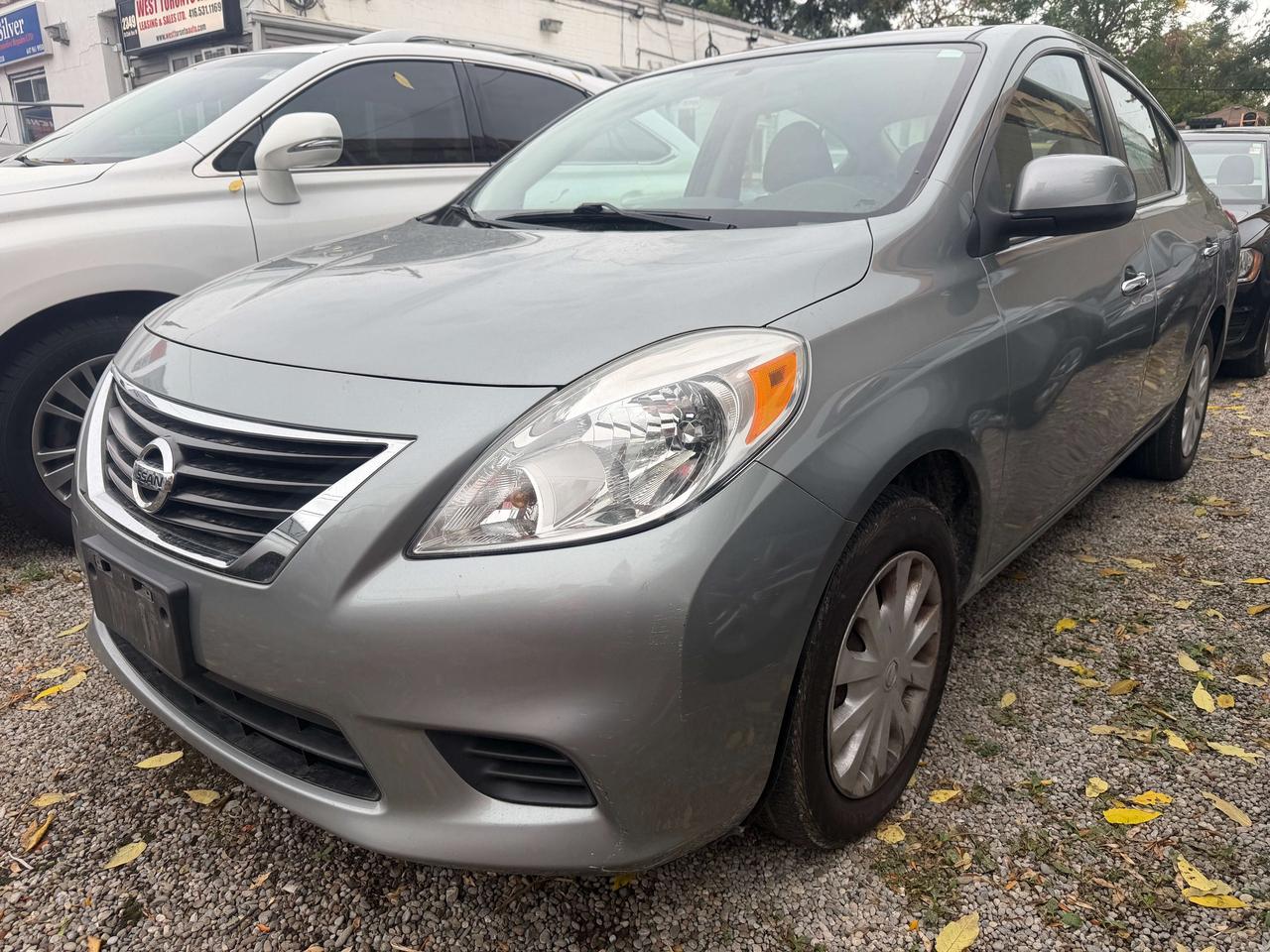 2012 Nissan Versa SV ! auto   116374 kms !! car fax cln ! certified Photo