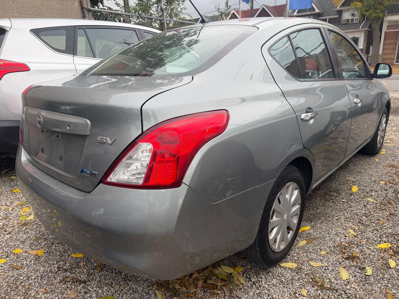 2012 Nissan Versa SV ! auto   116374 kms !! car fax cln ! certified Photo