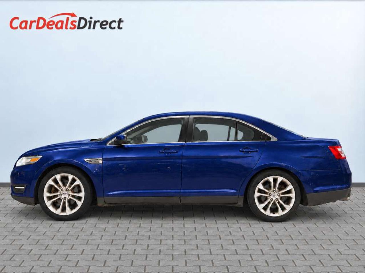 2013 Ford Taurus SEL / LEATHER / NAVI / SUNROOF / POWER SEATS / BLUETOOTH / KEYLESS ENTRY Photo