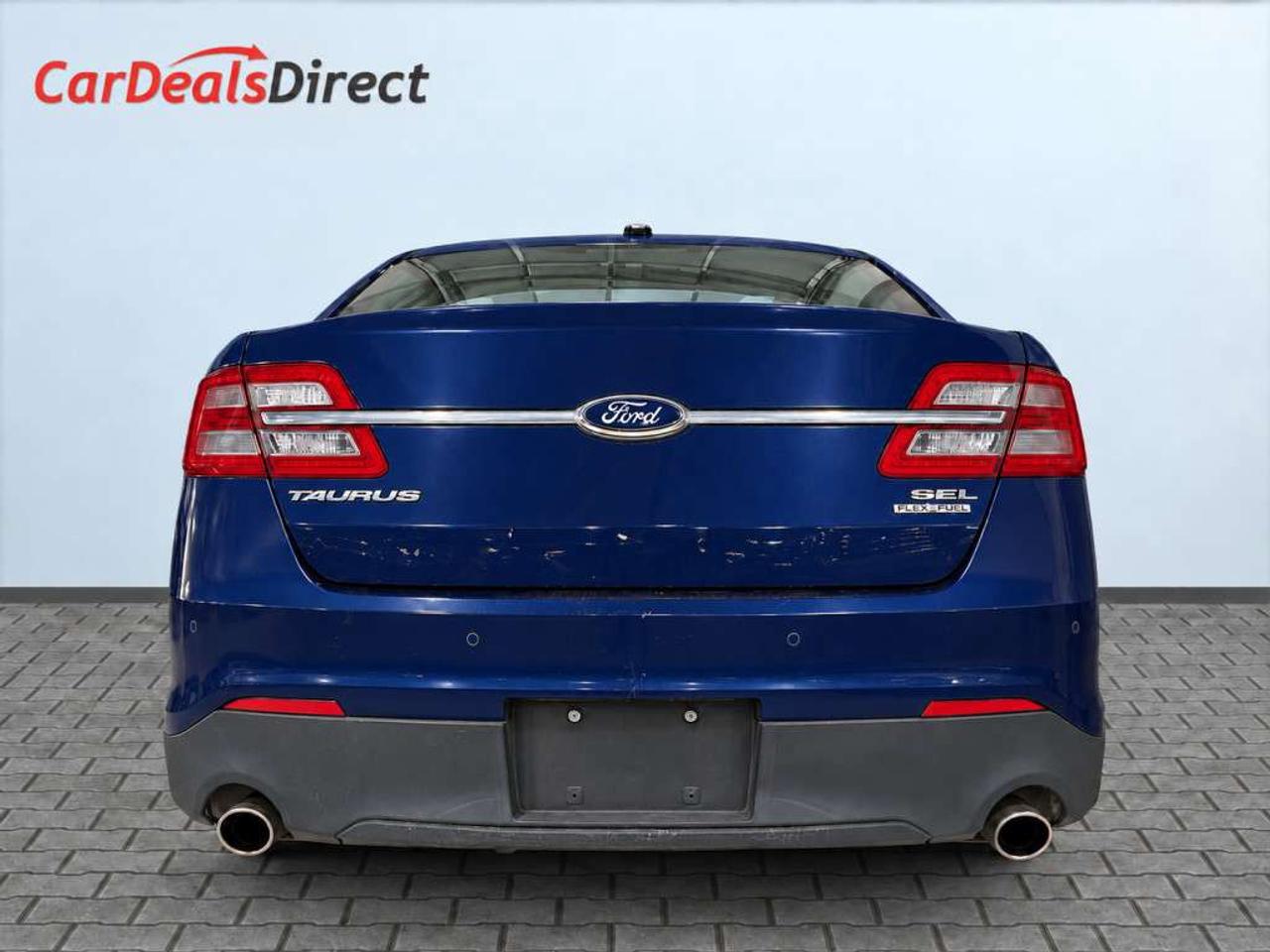 2013 Ford Taurus SEL / LEATHER / NAVI / SUNROOF / POWER SEATS / BLUETOOTH / KEYLESS ENTRY Photo