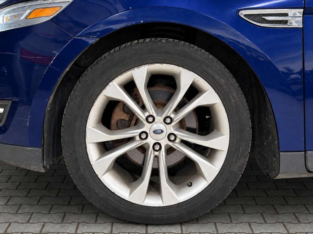 2013 Ford Taurus SEL / LEATHER / NAVI / SUNROOF / POWER SEATS / BLUETOOTH / KEYLESS ENTRY Photo