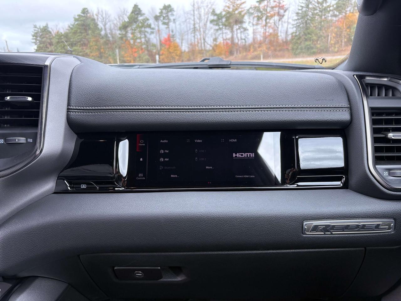 2026 RAM 1500 Rebel - htd/vntd seat - htd wheel - ram chargers Photo