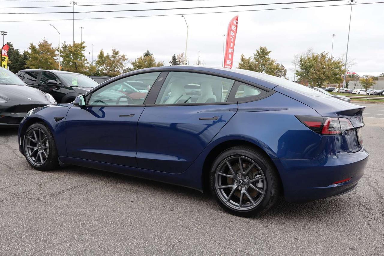 2023 Tesla Model 3 Standard Range Plus White Interior Photo