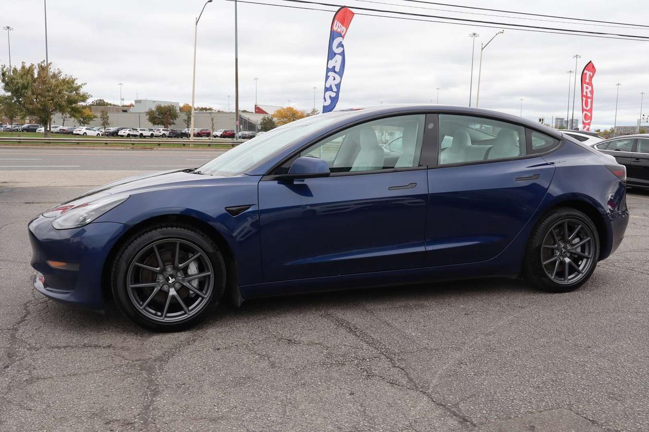 2023 Tesla Model 3 Standard Range Plus White Interior Photo2