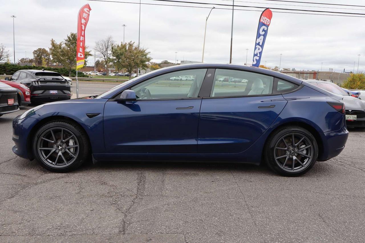 2023 Tesla Model 3 Standard Range Plus White Interior Photo
