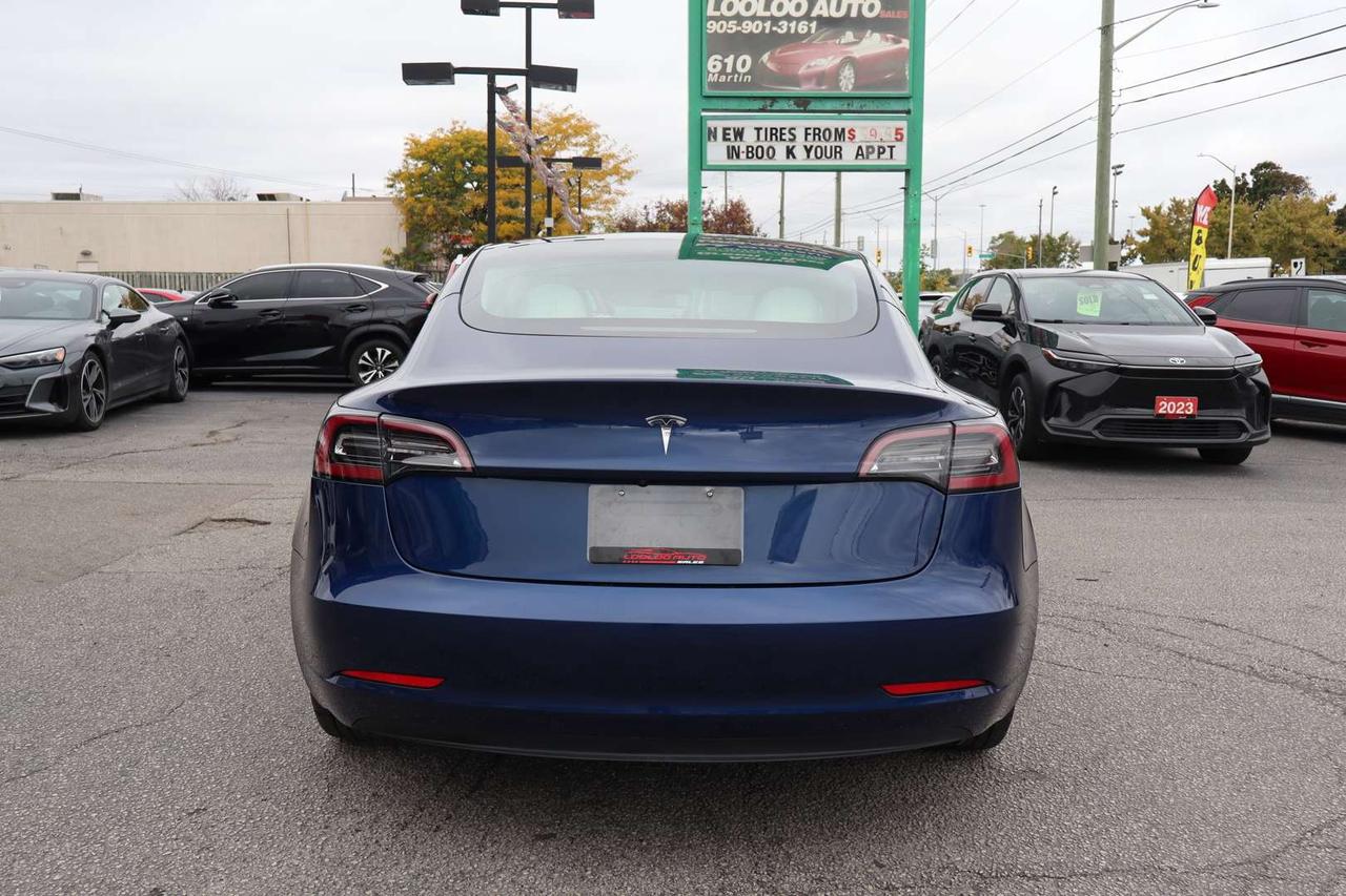 2023 Tesla Model 3 Standard Range Plus White Interior Photo